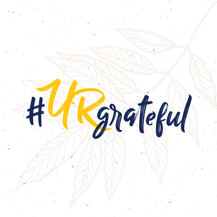 #UR grateful styled text over faint white background with tree branch