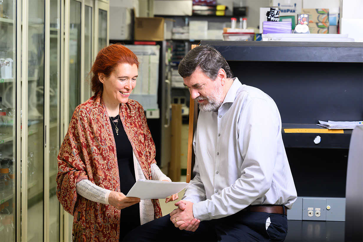 man and woman collaborating in research lab