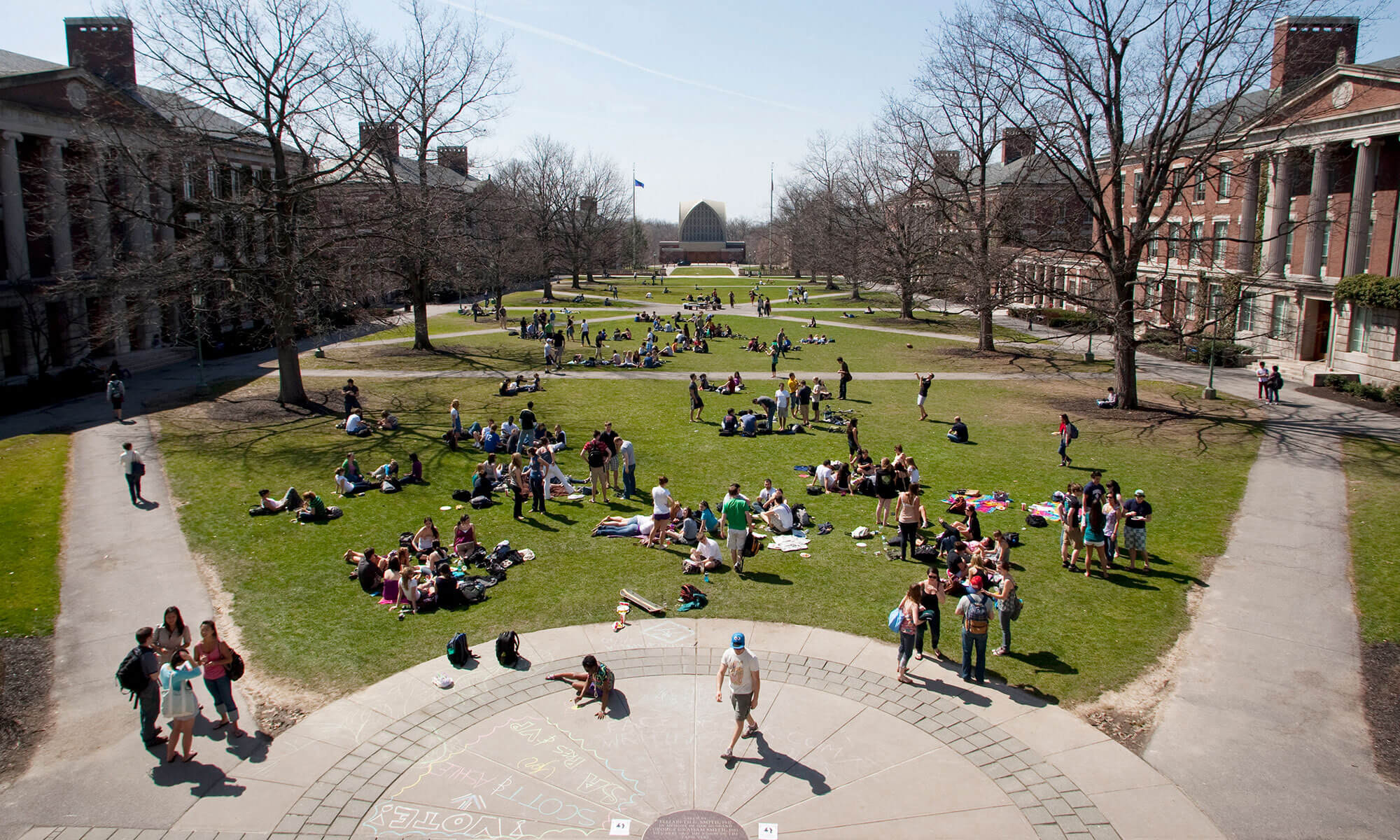 River campus quad with students hanging out in it