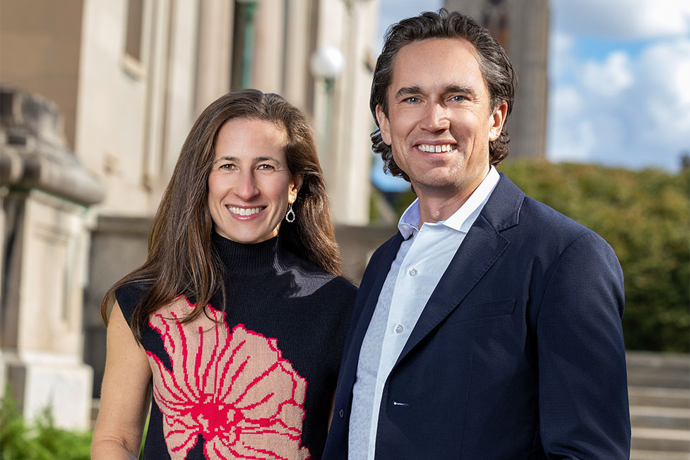 Abby and Doug Bennett are seen standing in front of the Memorial Art Gallery
