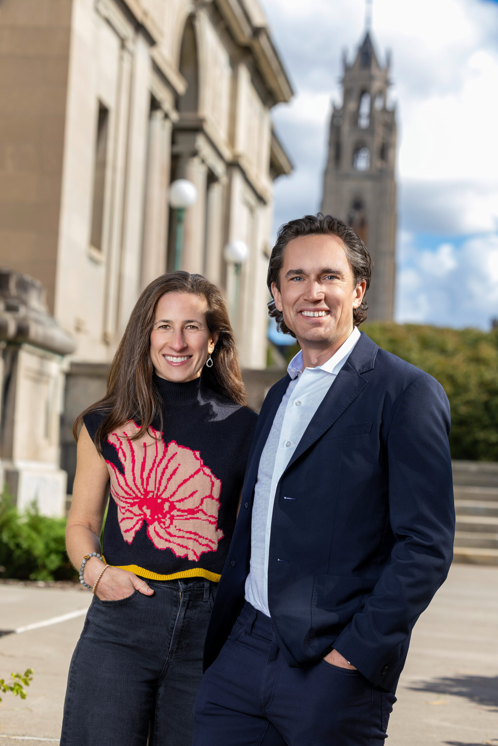 Abby and Doug Bennett are seen standing in front of the Memorial Art Gallery