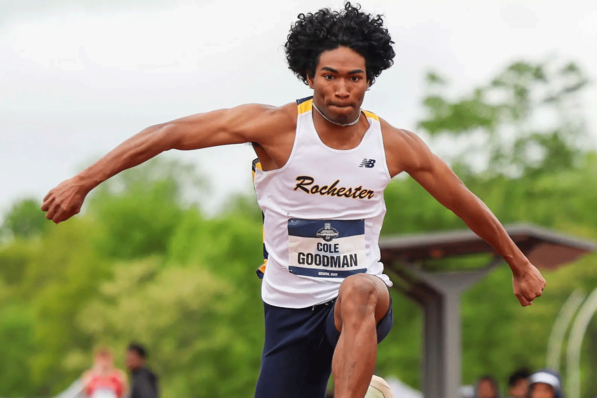 Cole Goodman '25 jumping a hurdle