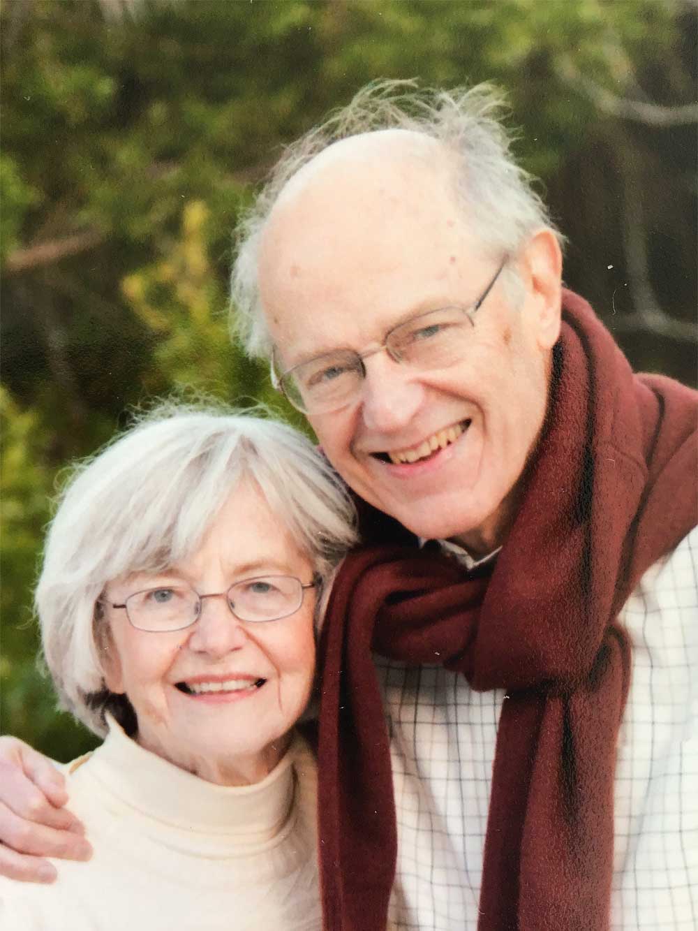 Shirley and Joe Eberly, seen smiling, holding each other