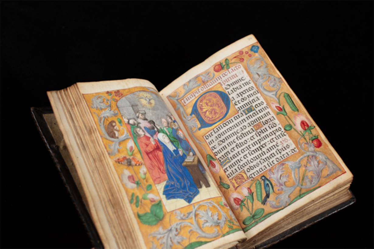 A storybook against a black background