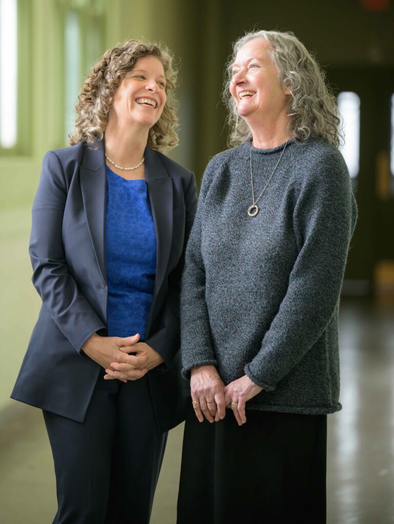 Jennie Noll, PhD, Professor of Psychology and Executive Director of Mount Hope Family Center, and Sheree Toth, Research Professor of Psychology and former Executive Director of Mt. Hope Family Center standing together