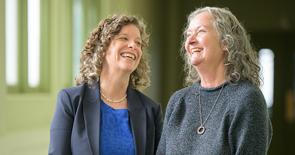 Jennie Noll, PhD, Professor of Psychology and Executive Director of Mount Hope Family Center, and Sheree Toth, Research Professor of Psychology and former Executive Director of Mt. Hope Family Center standing together