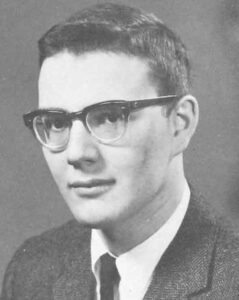 A young Alexander “Al” A. Levitan black and white photo wearing glasses