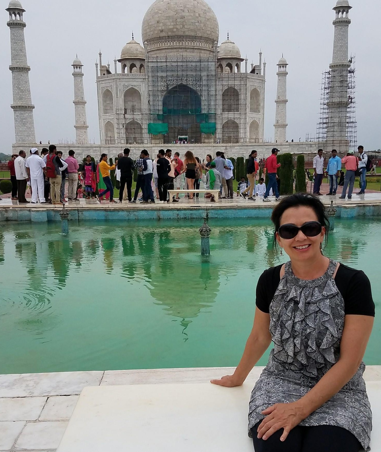 Kimberly Santiago sitting in front of the Taj Mahal