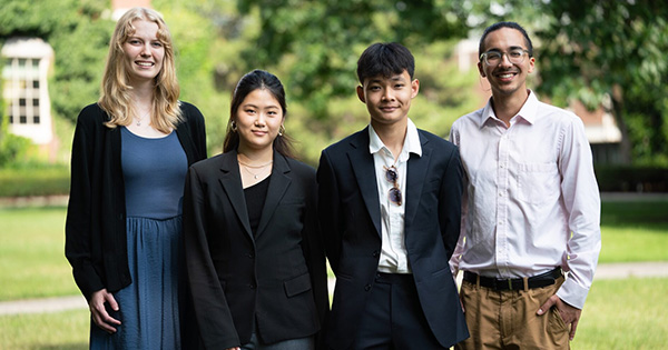 READY FOR BUSINESS: The inaugural cohort of Hire Rochester summer interns Alayna Leestma ’27, Claire Cho ’28, Triet Ly ’29, and Ivan Cea Gomez ’27. Not pictured: Pieran “Levi” Li ’27. (URochester photo / Gary Kong)